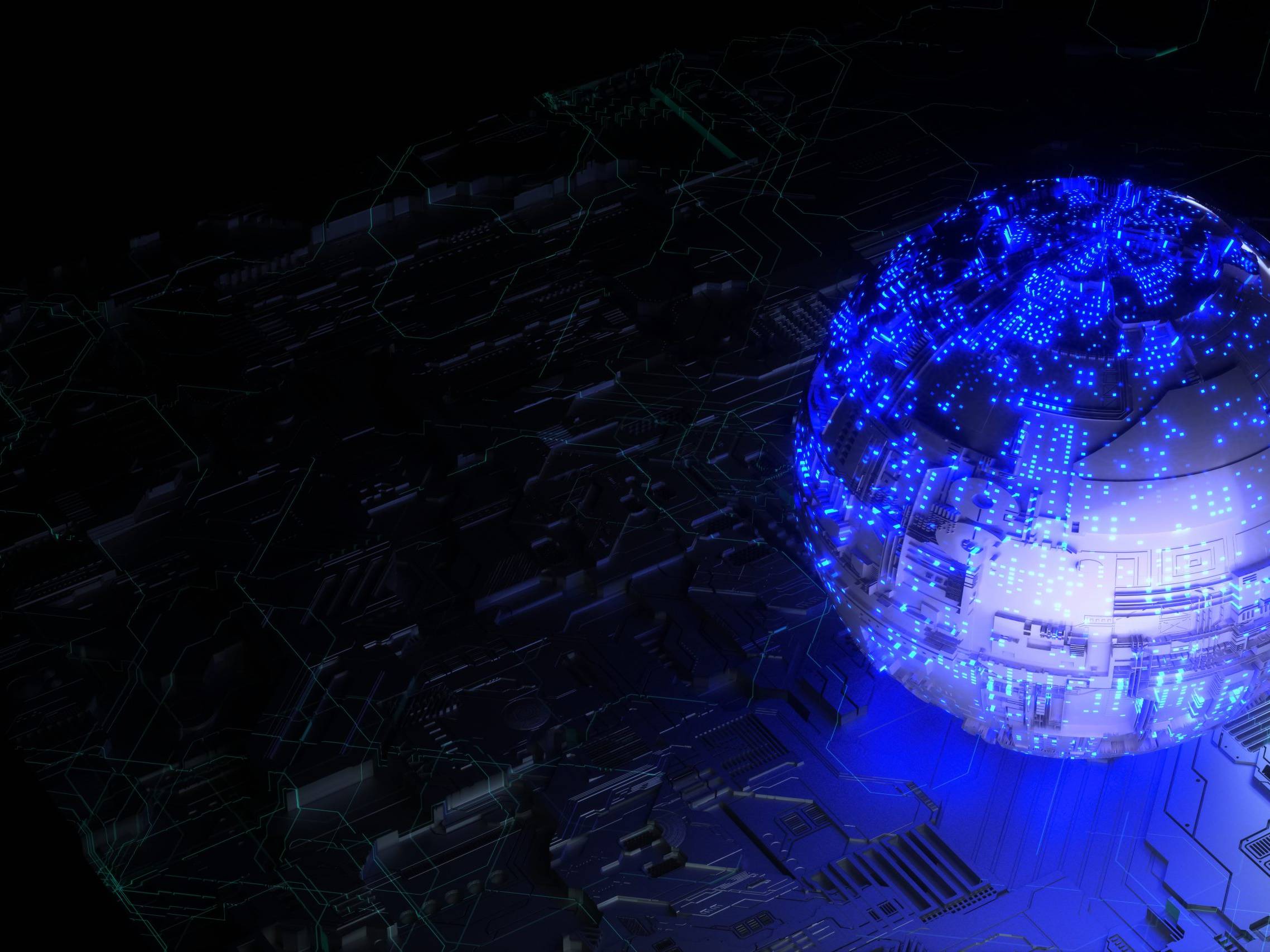 blue glowing sphere sitting on black circuit board
