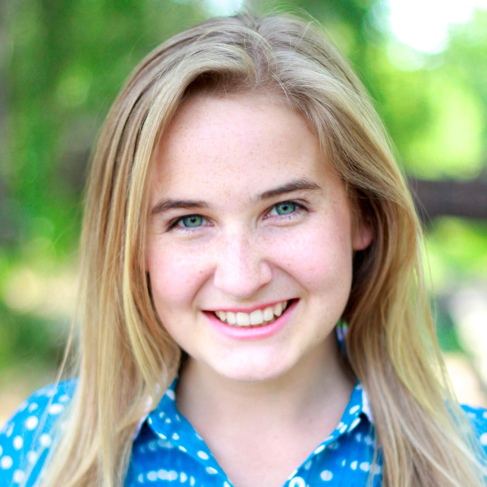 photo of Tess Smidt in front of trees