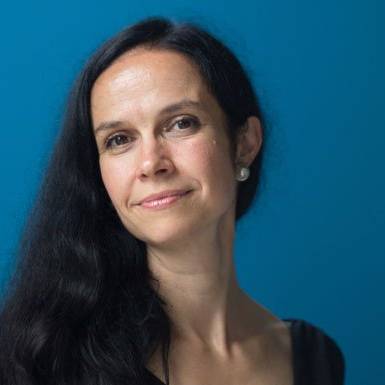 photo of Muriel Medard with blue background