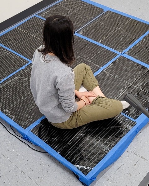 researcher seat on sensor carpet