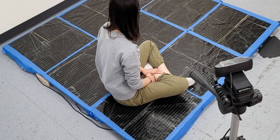 researcher seat on sensor carpet