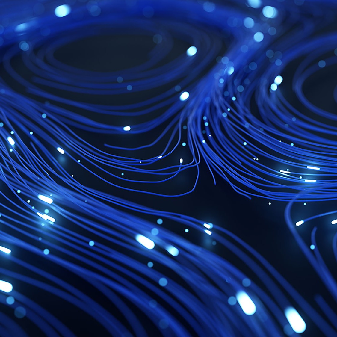Abstract background of lines and glowing particles in shades of blue and black.
