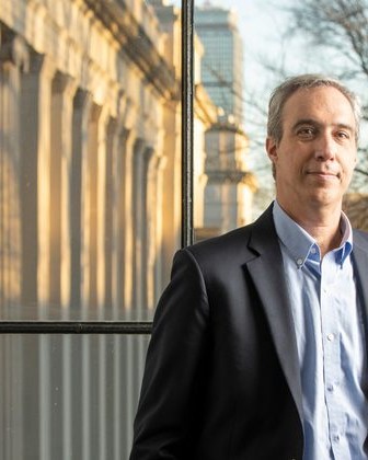 dan huttenlocher standing by window