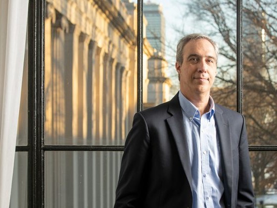 dan huttenlocher standing by window
