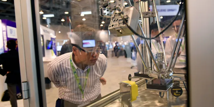 man looking at lab equipment Photo credit: Michael Short/Bloomberg via Getty Images