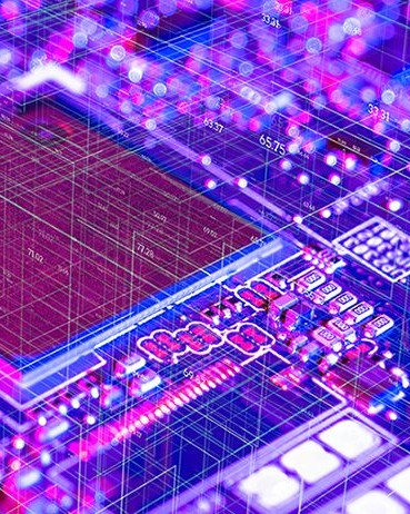 computer chip in strong magenta blue and purple lighting