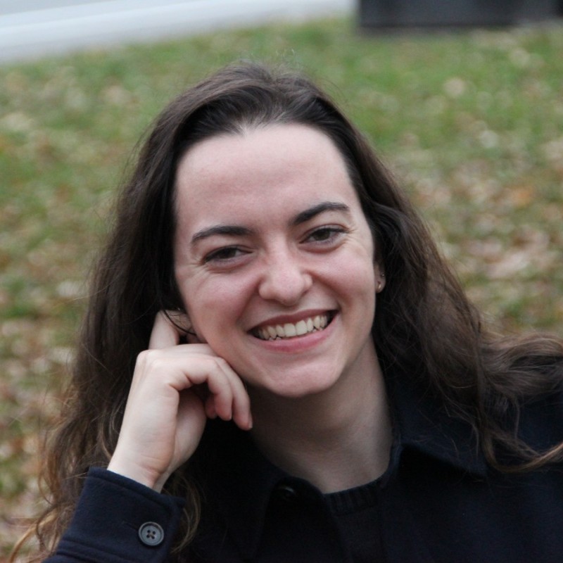brooke mcgoldrick seated outside on grass wearing dark coat