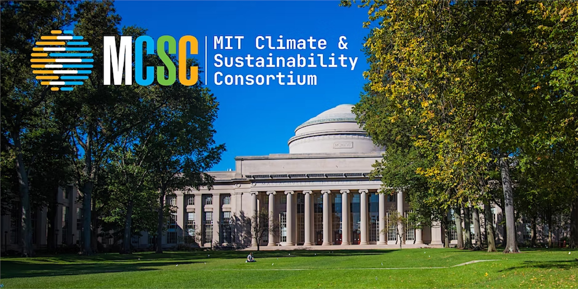 photo of MIT dome building with trees and lawn in front