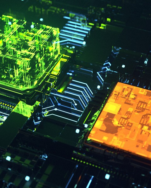 Computer motherboard image composed of green and orange colored rays