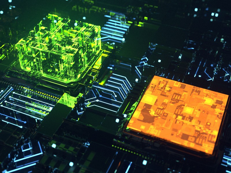 Computer motherboard image composed of green and orange colored rays