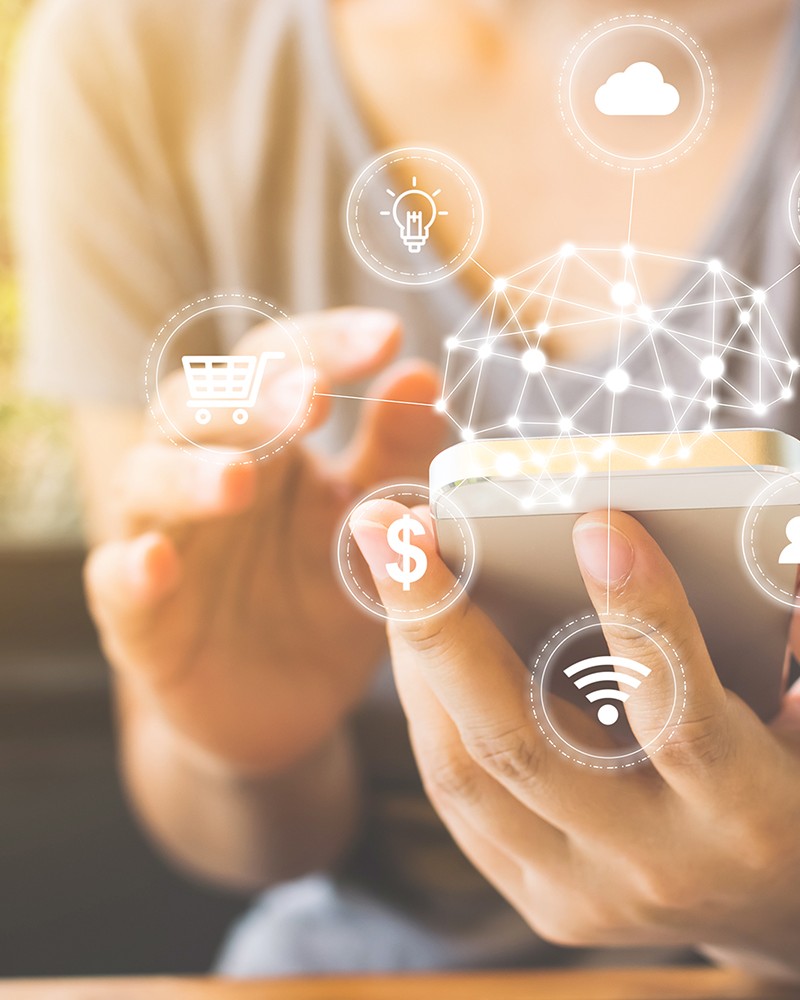 female hand using smartphone with icon technology artificial intelligence (AI) and internet of things (IOT)