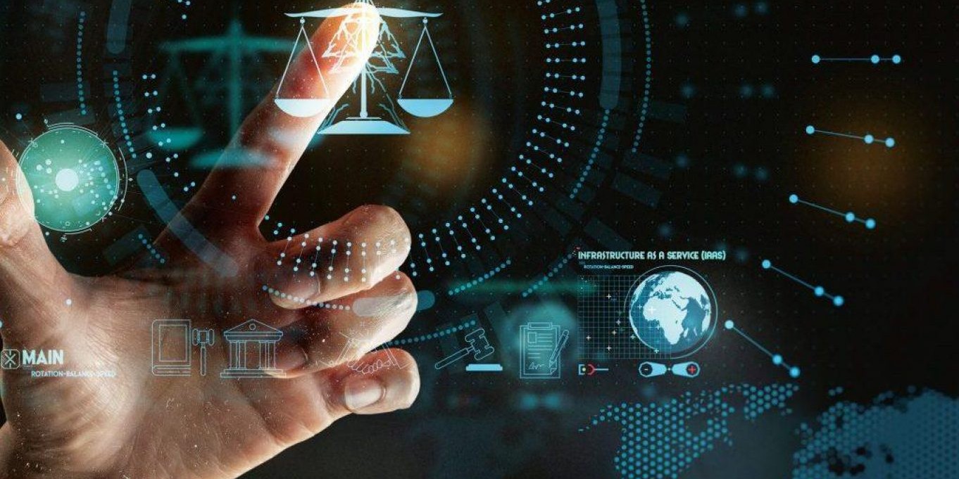 technology and ethics symbols overlaying a world map and hand pointing to ethics symbol all in shades of blue