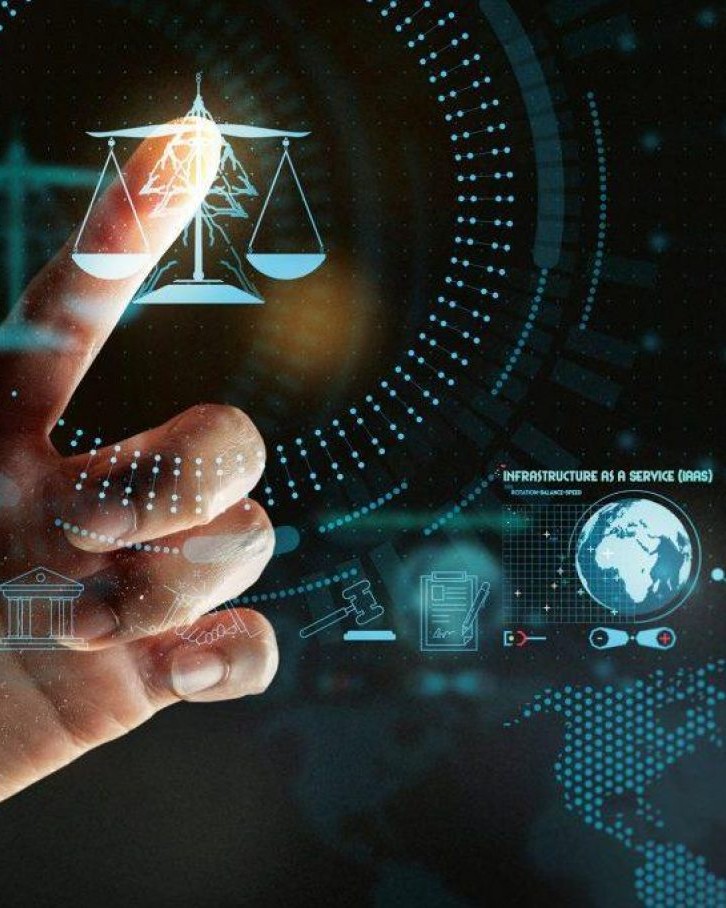 technology and ethics symbols overlaying a world map and hand pointing to ethics symbol all in shades of blue