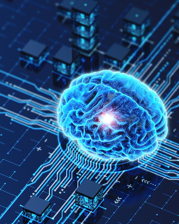 3D brain sitting on computer chip in shades of blue