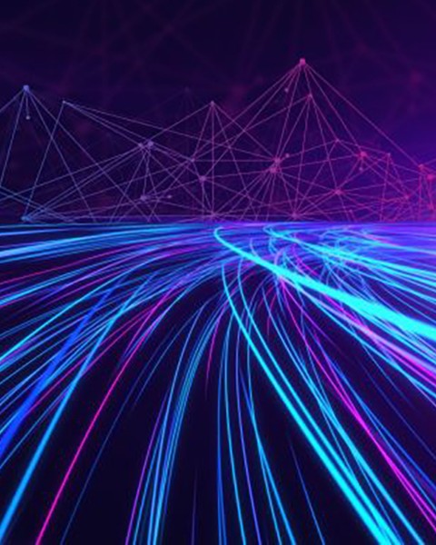 Graphic illustration showing blue and purple lines in the likeness of auto tail lights captured in a long exposure against a purple background. Mountains made of geometric triangle shapes appear in the background.