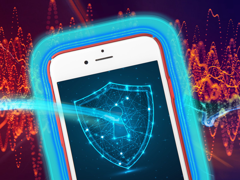 A cellphone has a blue shield which blocks red interference.