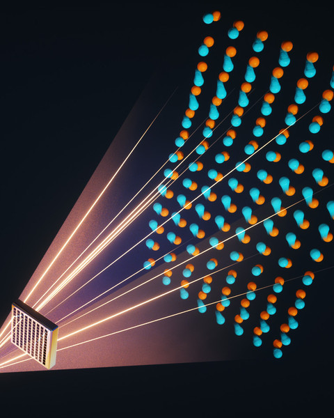 Graphic showing light emanating from a cubic crystal and passing through a material with an array of square holes. A lattice of atoms appears on the other side