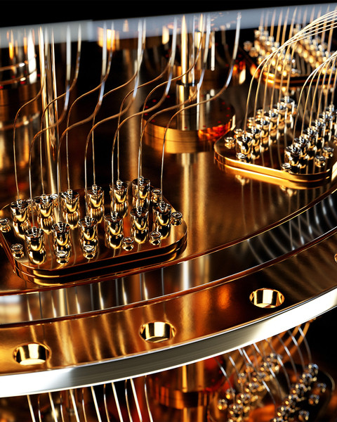 close up of a quantum computer made of gold toned metal