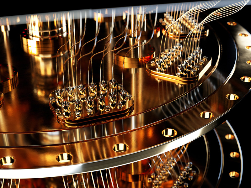 close up of a quantum computer made of gold toned metal