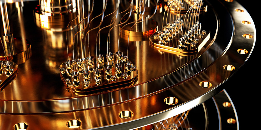 close up of a quantum computer made of gold toned metal