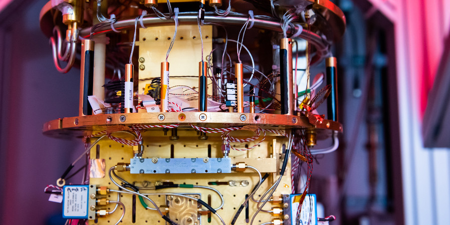 The colorful assemblage of cables and circuits that make up a quantum computer are shown in close detail.