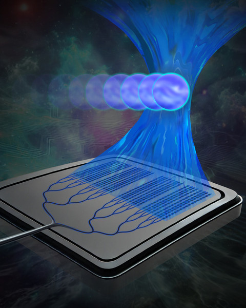 A computer chip focusing a beam of light onto round particles