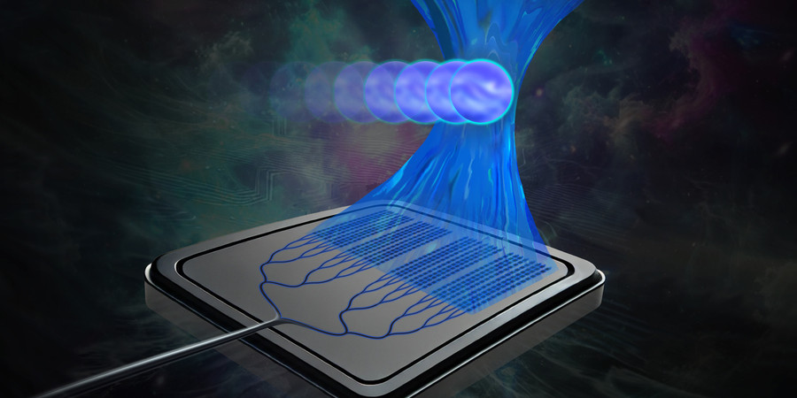 A computer chip focusing a beam of light onto round particles