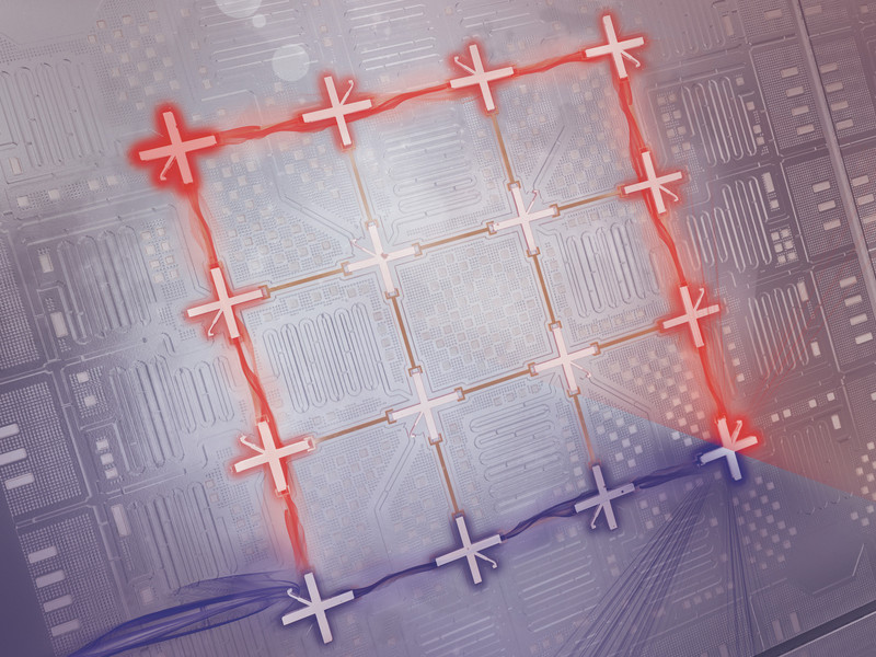A unique computer chip has red and blue light on grid-like pathways.