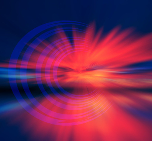 image of light flare in shades of red and pink on a dark blue background